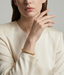 GOLD SORELLA TWIST BANGLE